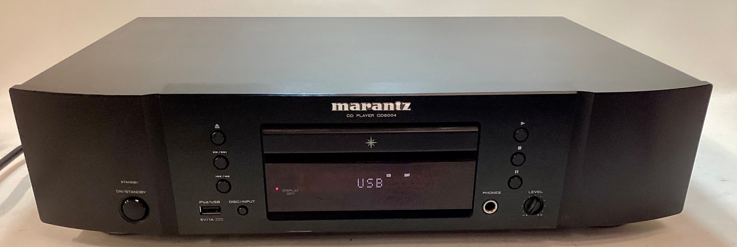 MARANTZ COMPACT DISC PLAYER. Nice condition here with model CD6004 complete with remote. Powers up