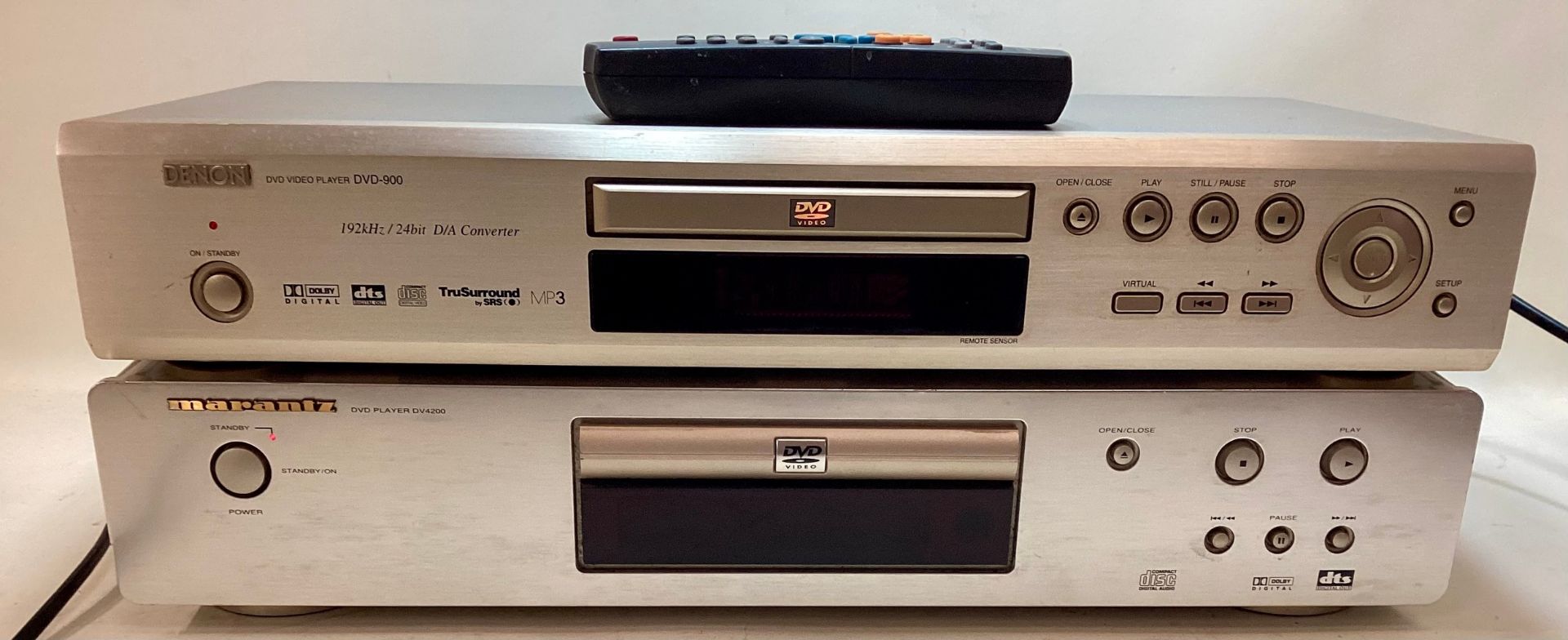 MARANTZ DVD PLAYERS X 2. Models here are DV4200/N1G and DVD-900. Both have their standby lights on