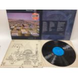 PINK FLOYD VINYL ALBUMS X 2. Here we have a copy of ‘A Momentary Lapse Of Reason’ on EMI Records
