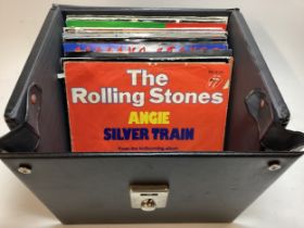 SELECTION OF ROLLING STONES RELATED 7” SINGLES. Found here in a singles case we have various singles