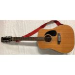 F HASHIMOTO DREADNOUGHT GUITAR. This is a right handed 12 string guitar with model No. T.520 made in