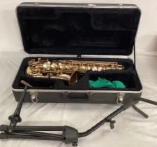 ALTO SAXOPHONE IN CARRY CASE WITH STAND.