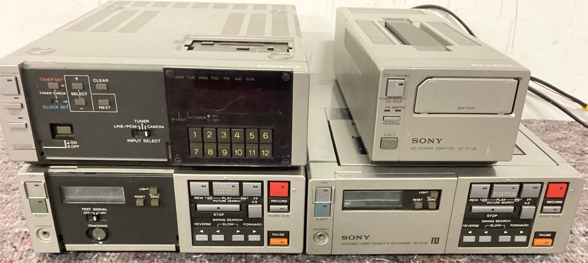 SONY BETAMAX VIDEO CASSETTE PLAYERS WITH ACCESSORIES. We have 2 x SL-F1UB cassette recorders along