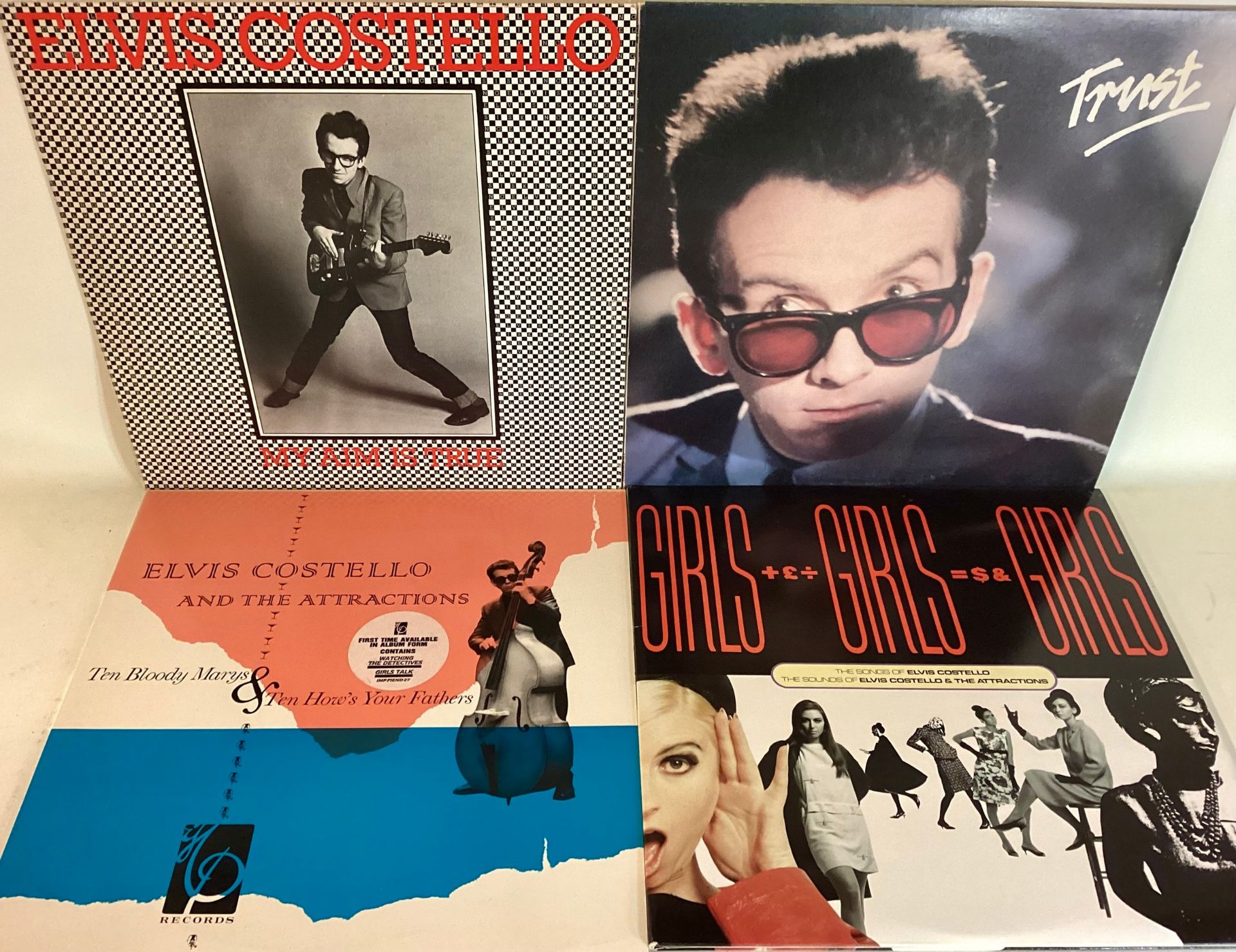 VARIOUS ELVIS COSTELLO VINYL LP RECORDS X 4. Copies found here of - Trust - Girls + £ + Girls - My