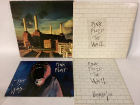 PINK FLOYD VINYL ALBUMS AND PROGRAMMES. Here we find a copy of ‘The Wall’ vinyl album on Harvest