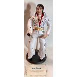 ELVIS PRESLEY DANBURY MINT COLLECTORS DOLL. A sculptured fine bisque porcelain figure in an