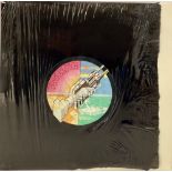 PINK FLOYD ‘WISH YOU WERE HERE’ VINYL ALBUM. This vinyl album has the black shrink wrap still
