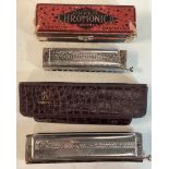 HOHNER HARMONICA’S X 2. Found here in their original containers we have a Professional Chromonica