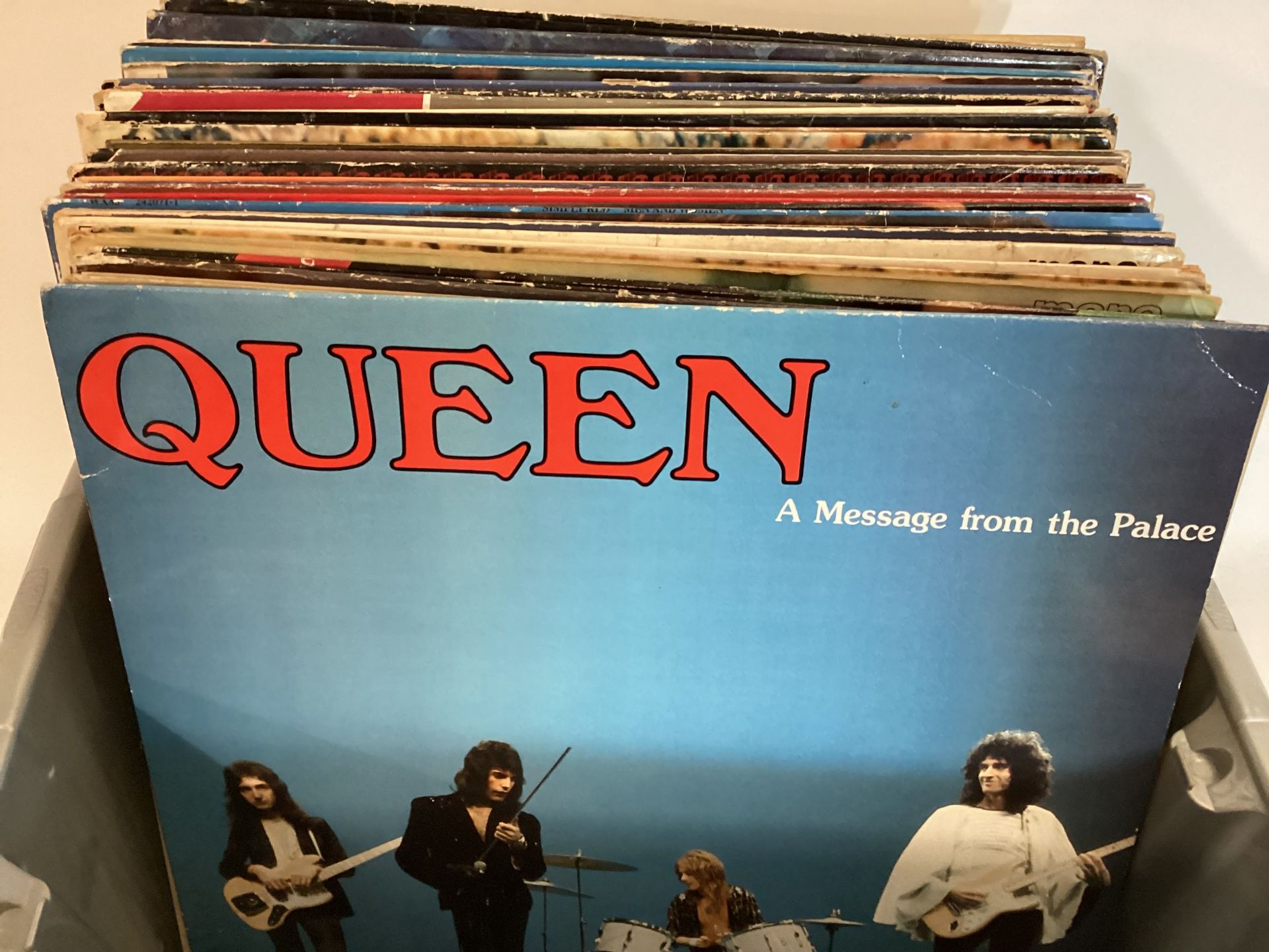 BOX OF VARIOUS ALBUMS FROM GROUPS AND VARIOUS ARTISTS. This collection includes - Status Quo - Queen