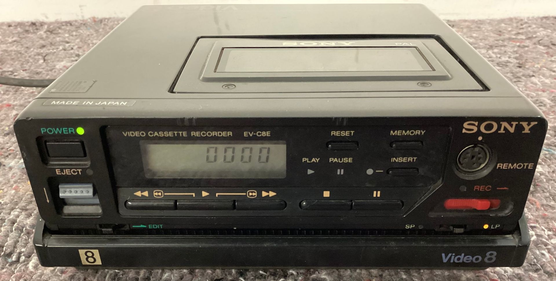 SONY VIDEO 8 TAPE PLAYER. This unit powers up when plugged in and is model No. EV-C8E.