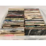 LARGE TRAY OF VARIOUS ROCK AND POP RELATED SINGLE RECORDS. Artists here include - Kate Bush - New