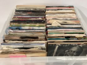 LARGE TRAY OF VARIOUS ROCK AND POP RELATED SINGLE RECORDS. Artists here include - Kate Bush - New