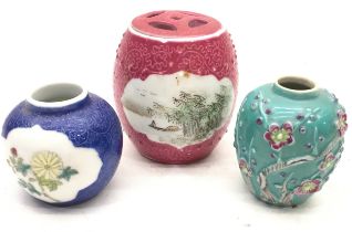 Three small Oriental pots.