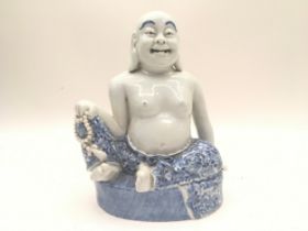 Japanese porcelain figure of a buddha/monk 22cm tall