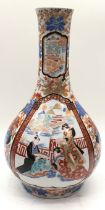 Japanese Kutani vase decorated with scenes of courtesans in cartouches on a floral background