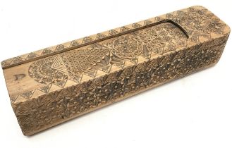 Heavily carved Chinese quill or pen box wit sliding opening 7x32x8cm