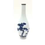 Chinese blue and white decorated vase depicting foliage standing on a low rim 21cm tall