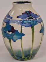 Moorcroft vase in the "Blue Heaven" pattern by Nicola Slaney signed and stamped to base 21cm tall.