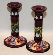 Pair of Moorcroft 21.5cms candlesticks in the Pansy pattern