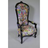 A black painted open armchair upholstered in Super Hero fabric, 100cm high