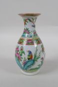 A late C19th Cantonese famille vert porcelain vase decorated with birds and butterflies amongst