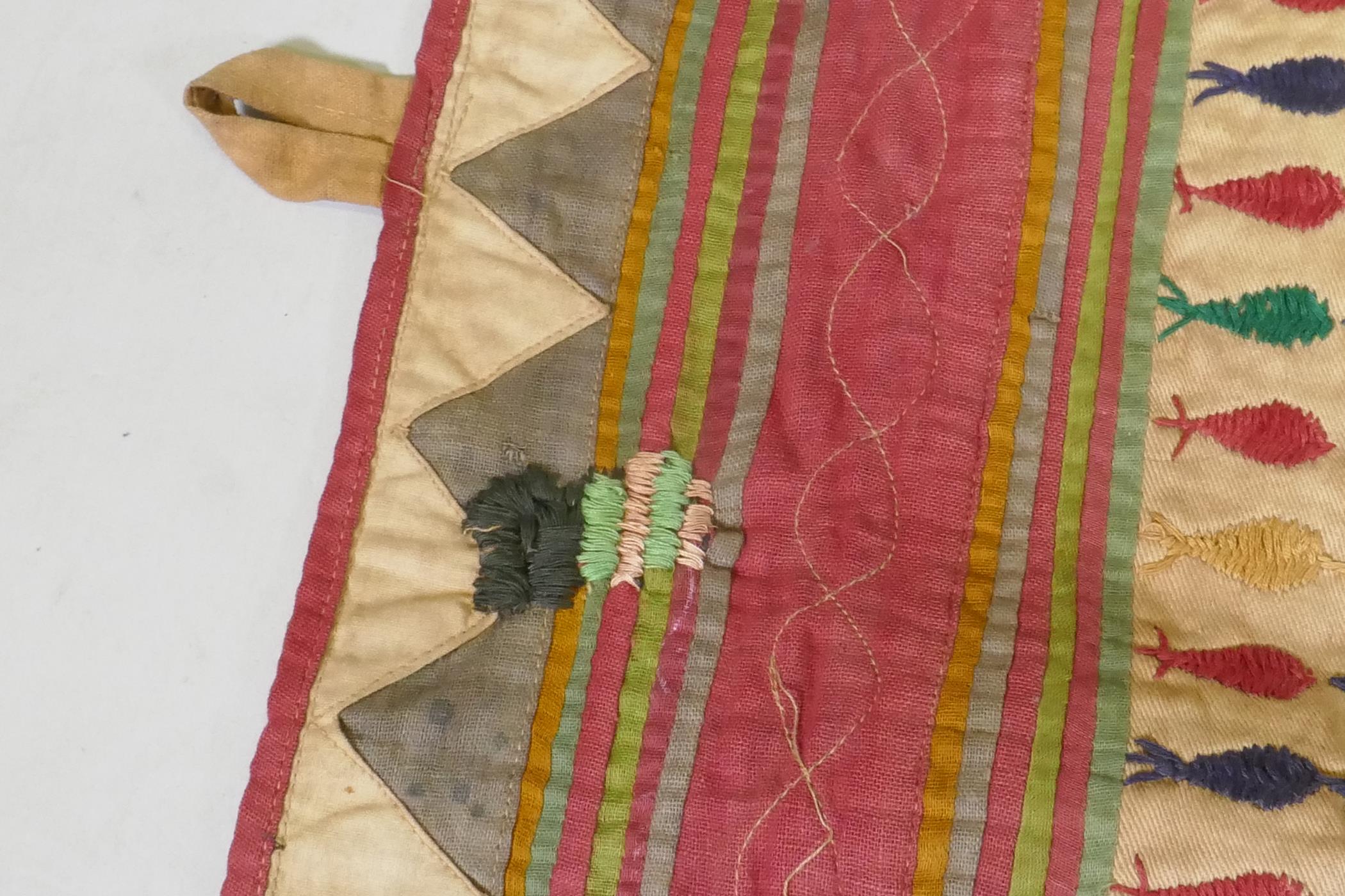 A C19th Indian embroidered wall hanging decorated with depictions of Ganesh, peacocks, elephants, - Image 8 of 9