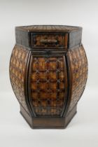 A hexagonal oriental cane lamp table/stool, 51cm high