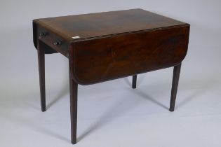 A Georgian mahogany pembroke table with single end drawer, raised on square tapering supports, 54