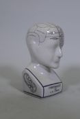 A ceramic phrenology head, 24cm high