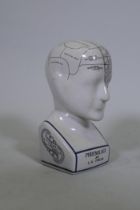A ceramic phrenology head, 24cm high