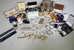 A quantity of costume jewellery including silver, amber, hand painted bangles etc