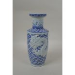 A Chinese blue and white porcelain vase with raised dragon decoration, impressed mark to base,
