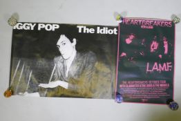 A vintage 'Iggy Pop - The Idiot' music poster, and a 'Heartbreakers L.A.M.F.' album launch poster,