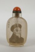 A Chinese reverse decorated glass snuff bottle decorated with a bearded noble, character inscription