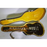 A vintage Japanese 'SG' type electric guitar and case