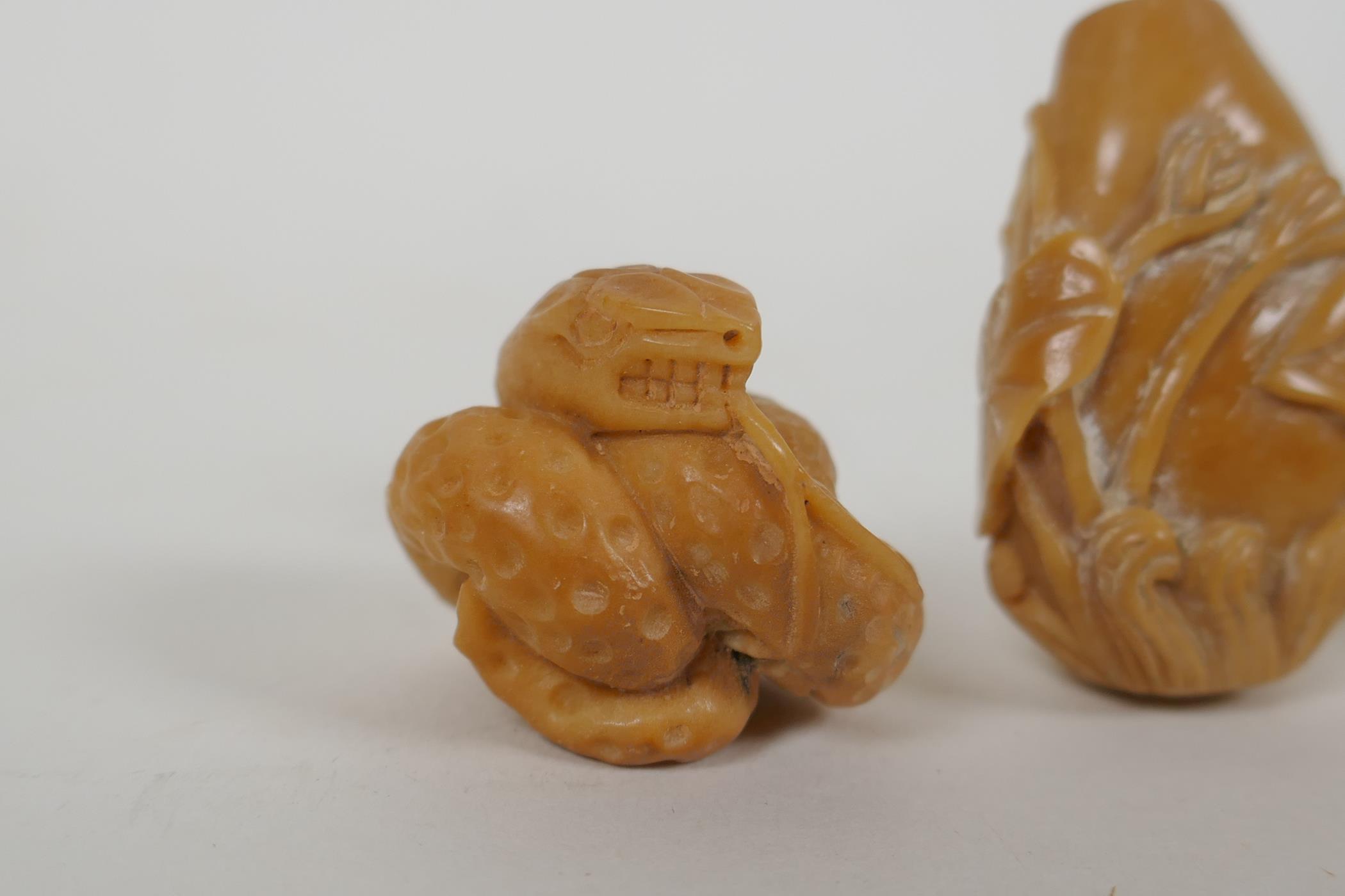 Five Japanese carved tagua nut netsuke in the form of rabbits, mice, lotus flowers and a snake, - Image 2 of 5