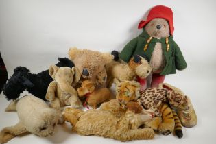 A collection of vintage stuffed toys including an Angus Terrier, plush dog with rubber head,
