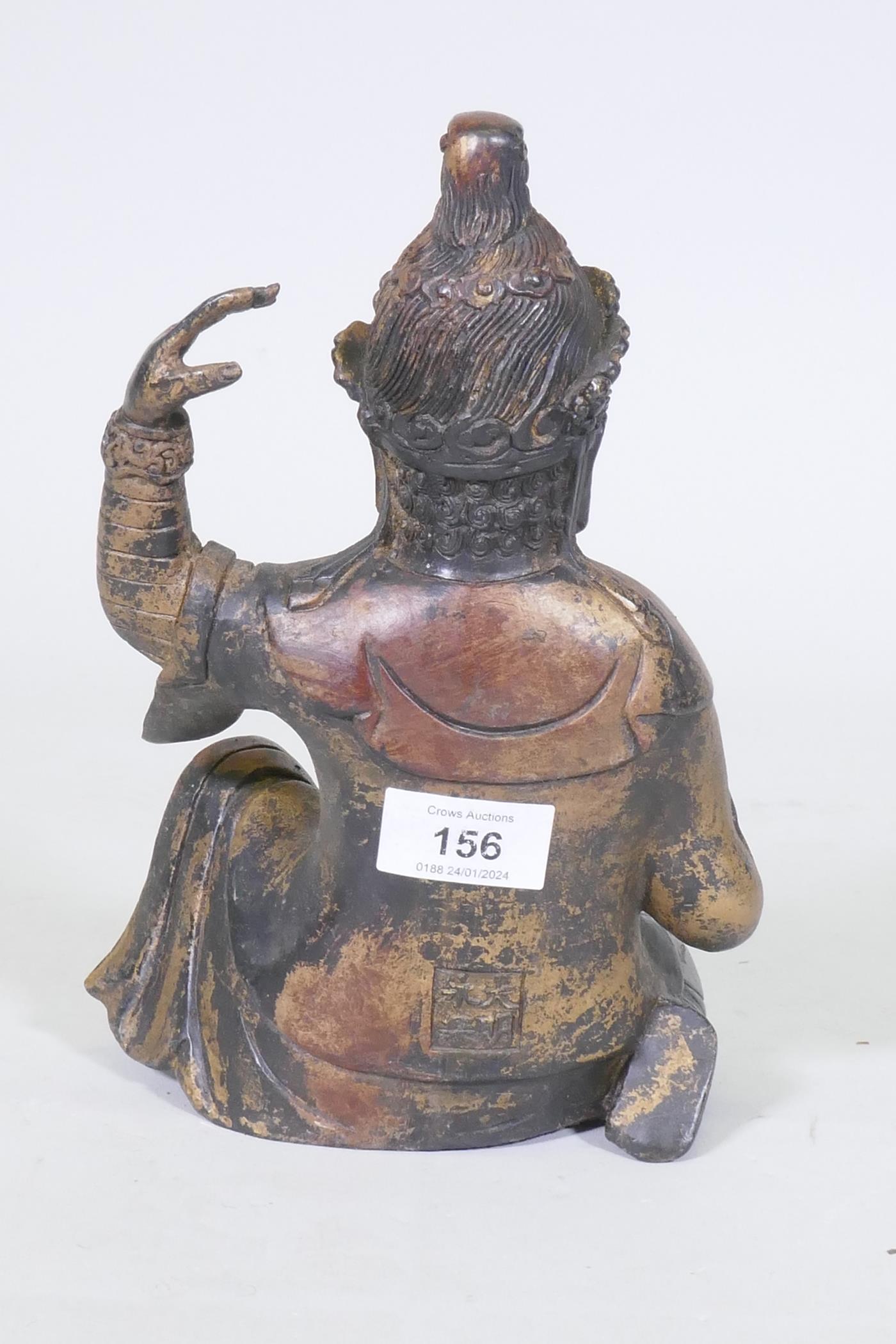 A Chinese bronze figure of an immortal, with red and gilt patination, impressed seal mark to base, - Image 3 of 7