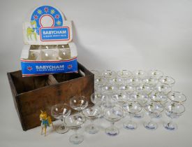 A collection of 30 vintage Babycham glasses, including six in original display box, a plastic