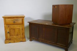 An oak veneered triple panel coffer raised on stile supports, 88 x 44 x 46cm, together with a