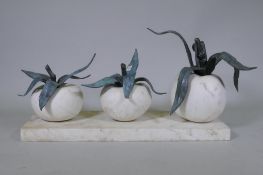 A marble sculpture of three tomatoes with bronze mounts, on a marble base, 84 x 33cm, 36cm high
