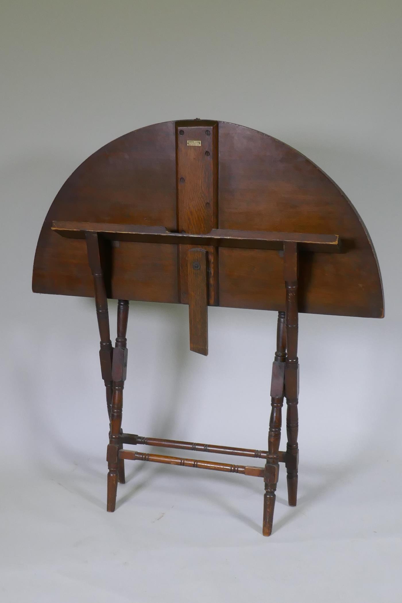 An early C20th beechwood coaching table, bears label Thornton & Herne, 13 Little Cadogan Place, Pont - Image 3 of 4