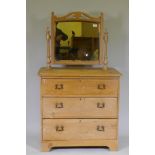 A Victorian stripped pine dressing table with swing mirror and three drawers, 81 x 46 x 17cm
