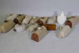 A collection of C19th/C20th stoneware footwarmers and a hot water bottle by Royal Doulton,