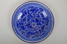 An C18th/C19th Delft blue and white charger, 32.5cm diameter