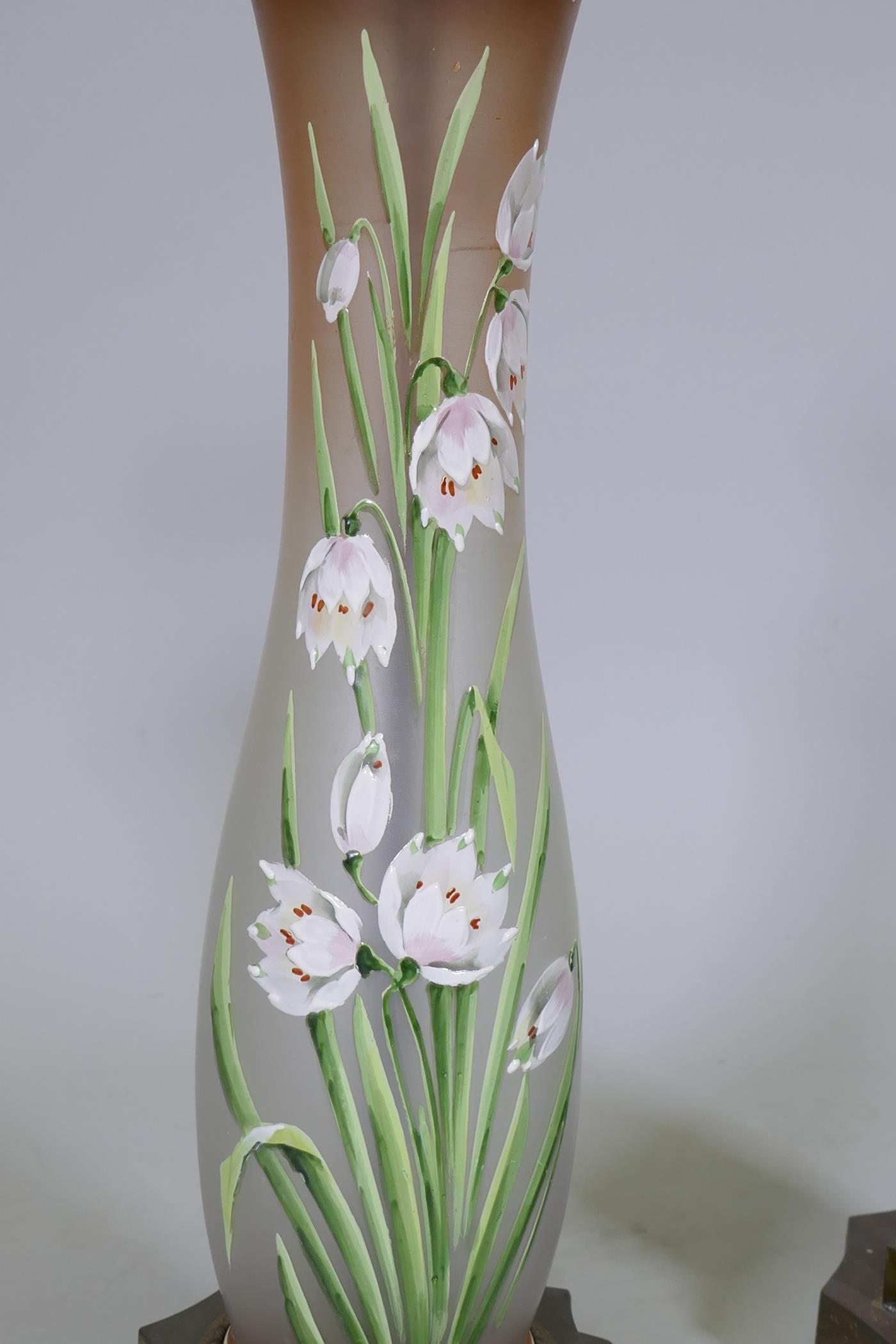 A pair of opaline glass table lamps with hand painted enamel decoration, raised on metal bases, 56cm - Image 2 of 4