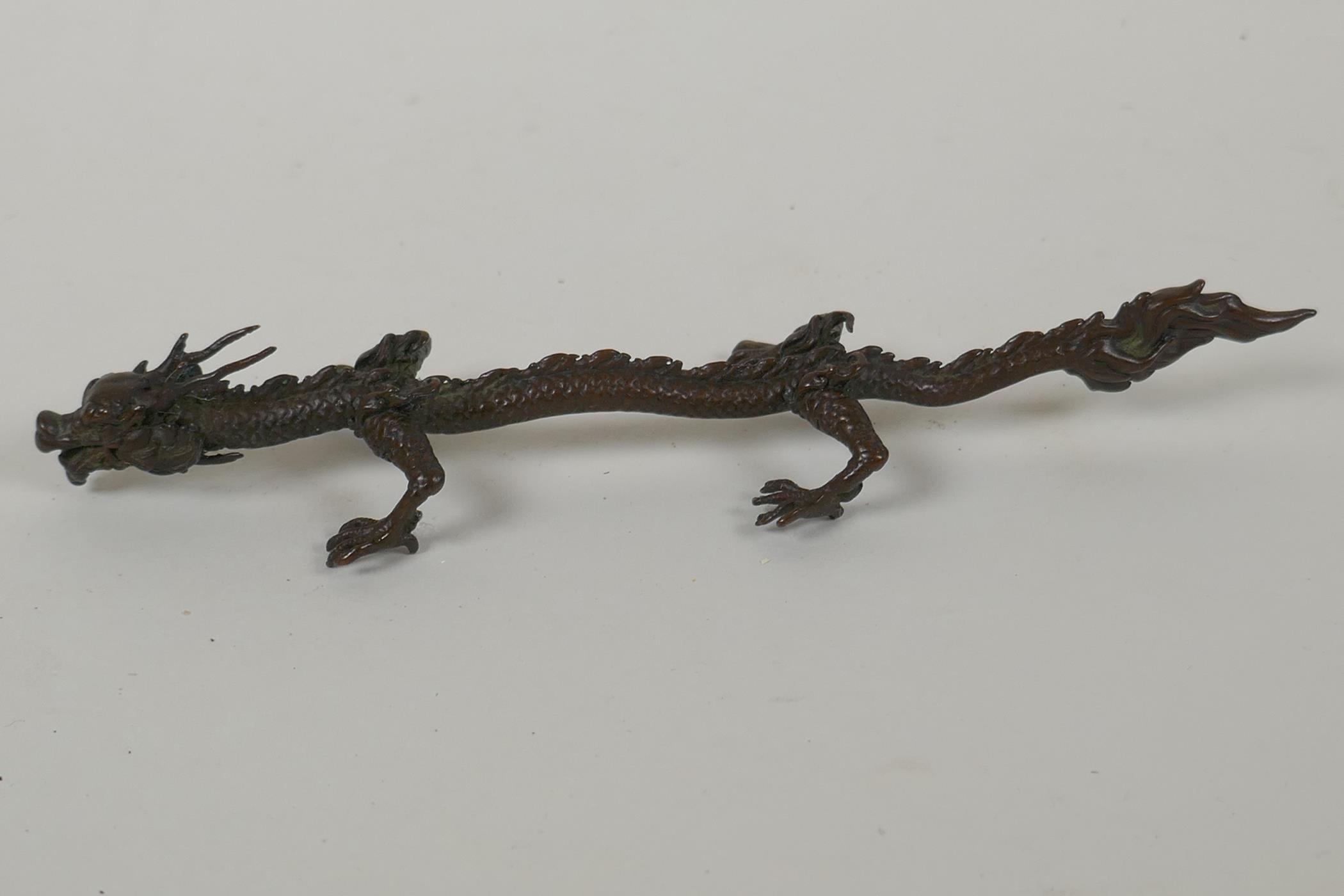 A Japanese style bronze okimono dragon, 16cm long - Image 3 of 3