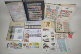 A quantity of world stamps, First Day covers and complete and unused stamp books