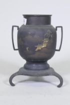 An antique Japanese bronzed vase with engraved gilded decoration, raised on a shaped base with