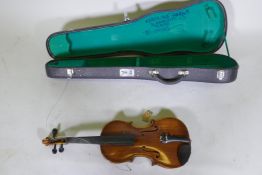 A violin in case, AF repaired